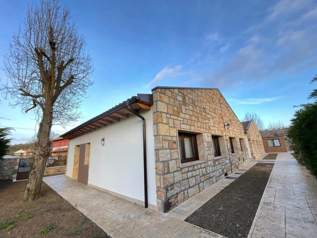 Approved exterior source photo showing the property arrival